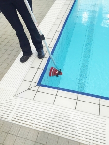 MotorScrubber Cleaning Dirty Pool
