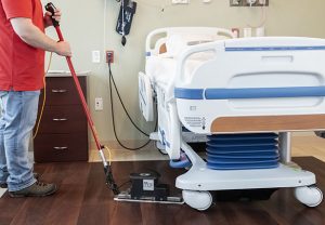 cleaning mopping under hospital beds toronto