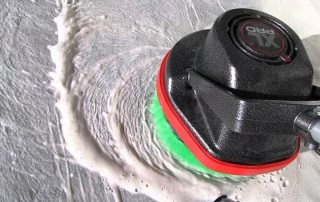Oreck Orbiter Scrubbing Concrete Floors