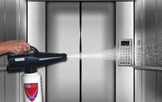 spraying disinfectant elevator coronavirus